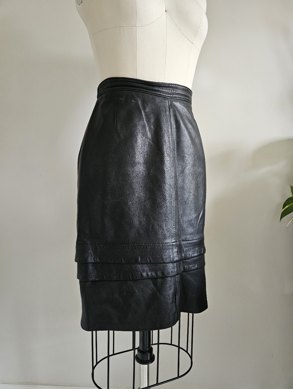 VINTAGE black leather fitted pencil skirt with pleating around hem
